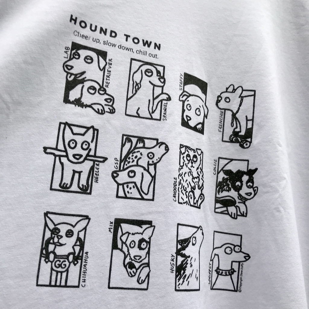 Blak cartooon dogs artwork screen printed on white fabric with the words Hound Town and Cheer Up, Slow Down, Chill Out written at the top.